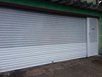 Portas de aço de enrolar, basculantes, molas, graxa, portas de aço automáticas, portas de aço, portões, motor para portas, motor para portões, motor para portas de aço, aço, portas, serralheria.